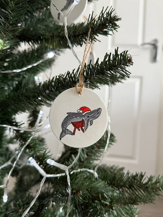 A Whale in a Manger Christmas Bauble